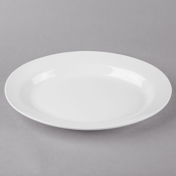 A white Thunder Group oval melamine platter with a rim.