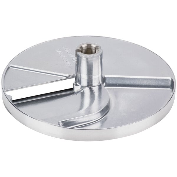 A Robot Coupe 3/8" stainless steel slicing disc with a hole in the center.