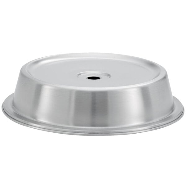 A Vollrath stainless steel dome plate cover over a plate.