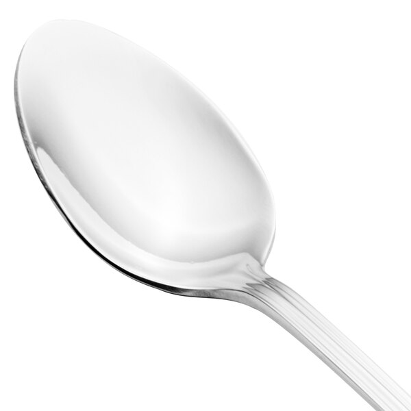 A close-up of a Walco stainless steel iced tea spoon with a white handle.