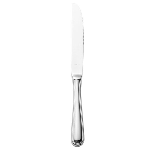 A Walco stainless steel table knife with a silver handle.