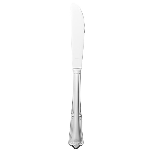 A silver Walco Barony stainless steel table knife with a white background.