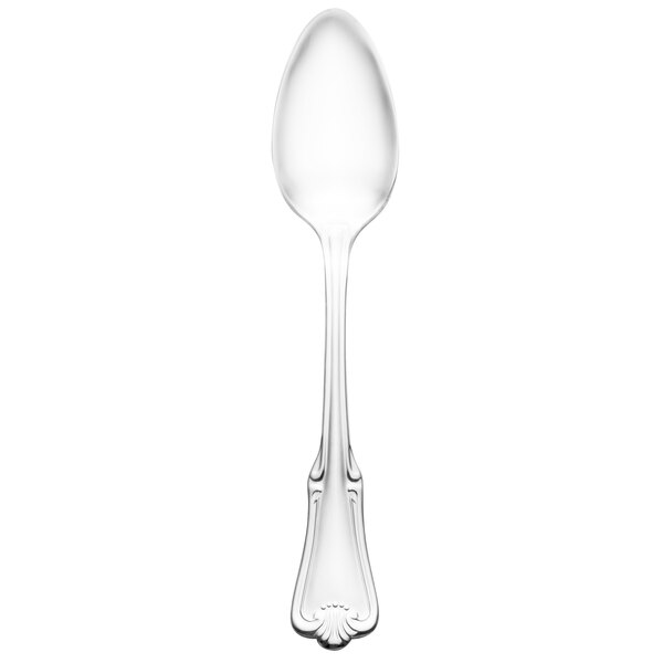 A Walco stainless steel dessert spoon with a handle.