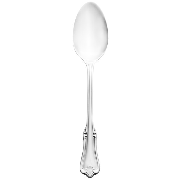 A Walco stainless steel serving spoon with a silver handle.