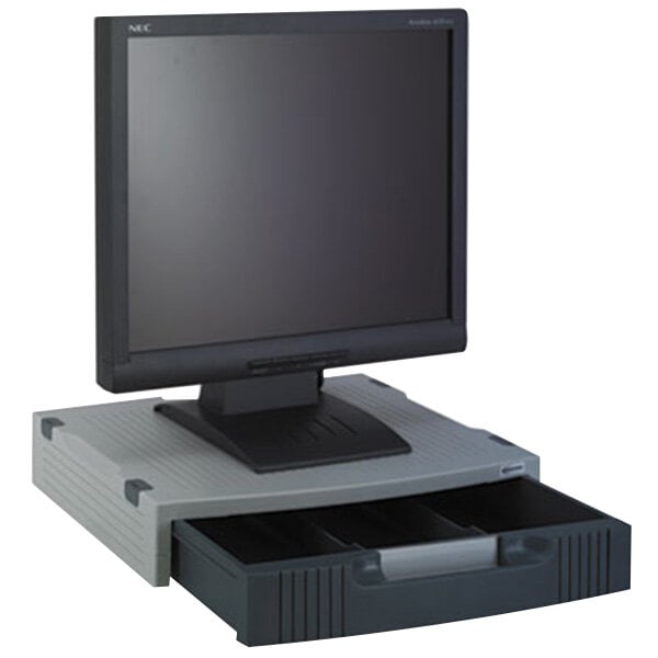 An Innovera monitor riser with a drawer underneath a computer monitor.