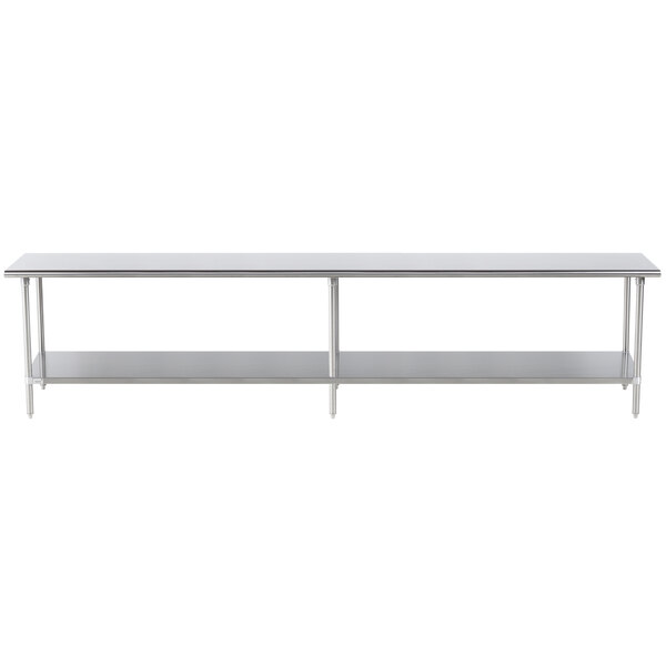 A long silver shelf with metal legs attached to a stainless steel table.