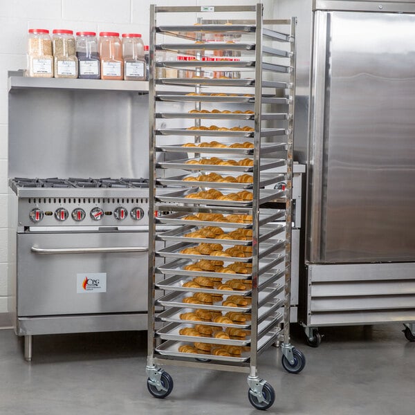 A Regency stainless steel sheet pan rack with food on it.