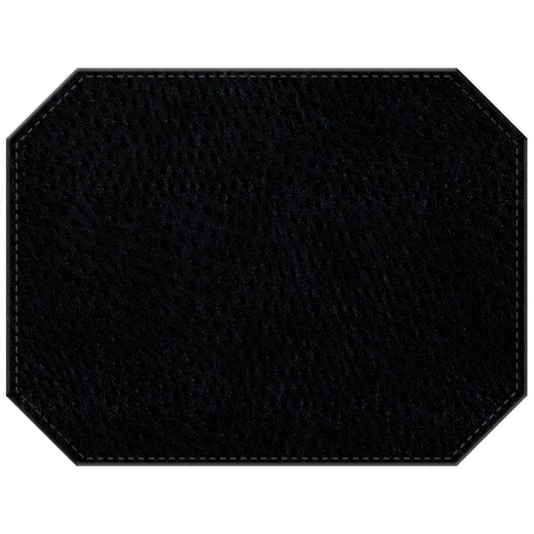 A black faux leather octagon placemat with stitching.