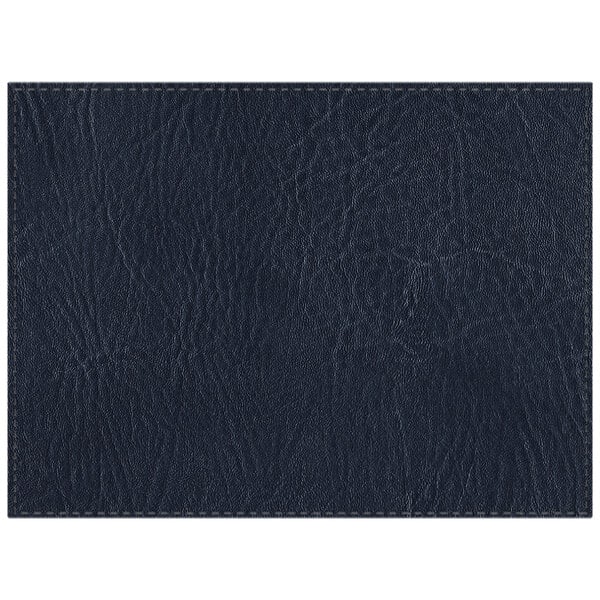 A close up of a blue faux leather rectangle placemat with stitching.