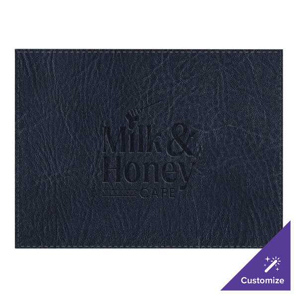 A navy H. Risch, Inc. faux leather rectangle placemat on a table with a black leather cover with text.