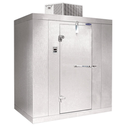 A Norlake Kold Locker walk-in freezer with a white metal door.