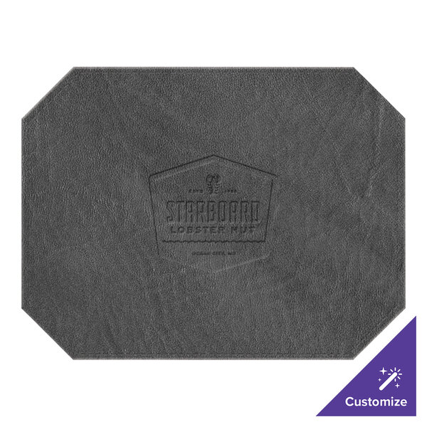 A grey leather H. Risch Inc. placemat with a logo on it.