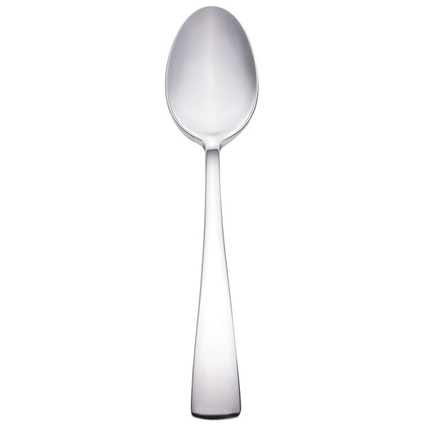 A close up of a Walco Freya stainless steel teaspoon with a silver handle on a white background.