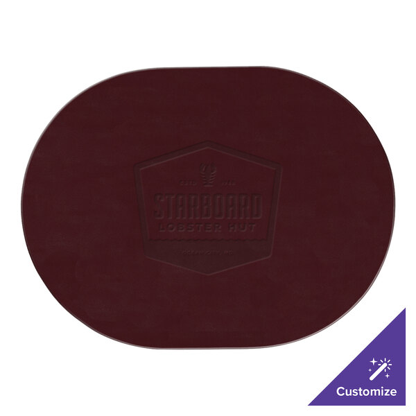 A red oval vinyl placemat with a wine logo.