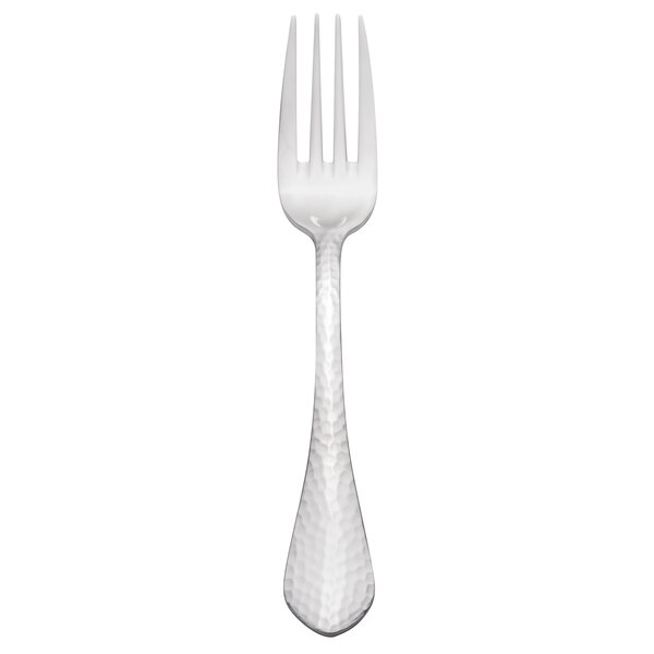 A close-up of a Walco stainless steel dinner fork with a black top and silver handle.