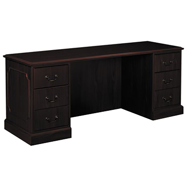 A mahogany HON kneespace credenza with drawers.