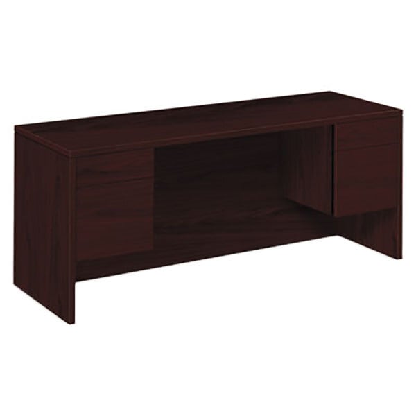 A dark wood HON pedestal credenza with drawers.