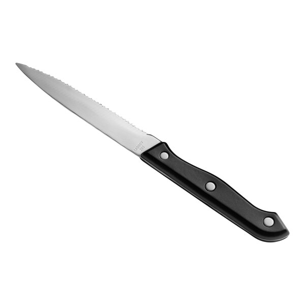 A Libbey stainless steel steak knife with a black bakelite handle.
