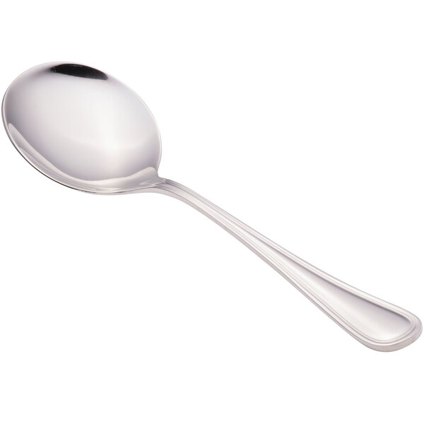 A close-up of a Walco stainless steel bouillon spoon with a silver handle.