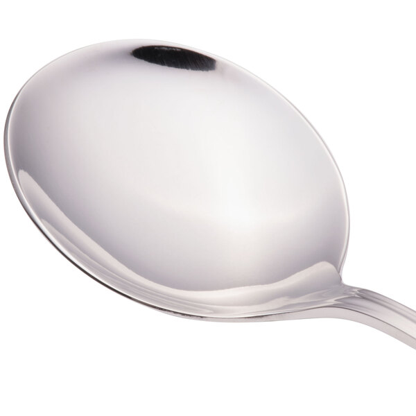 A Walco stainless steel bouillon spoon with a silver handle.