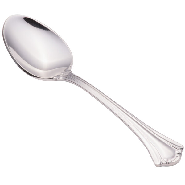 A Walco stainless steel demitasse spoon with a handle.
