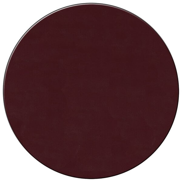 A dark brown round vinyl placemat with a white circle in the center.