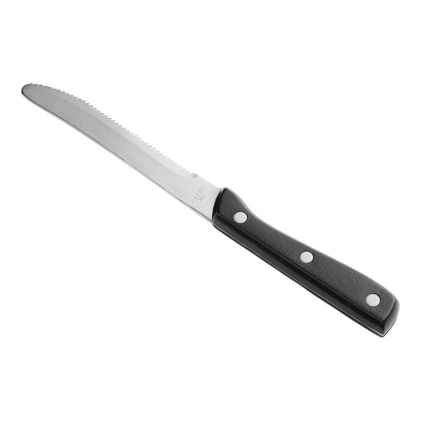 A Libbey steak knife with a black bakelite handle.