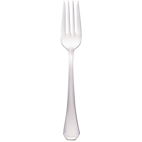 A close-up of a Walco stainless steel salad fork with a white handle.