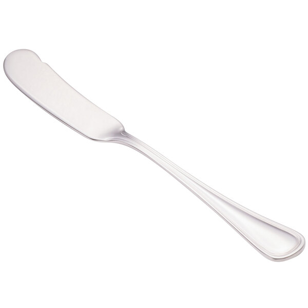 A Walco stainless steel butter spreader with a flat handle.