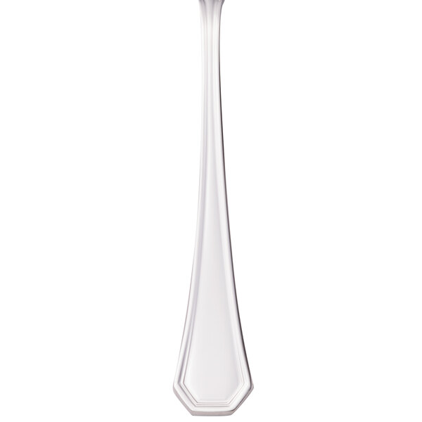 A close-up of a Walco stainless steel cocktail fork with a white background.