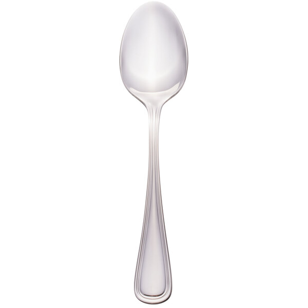 A Walco stainless steel dessert spoon with a silver handle.
