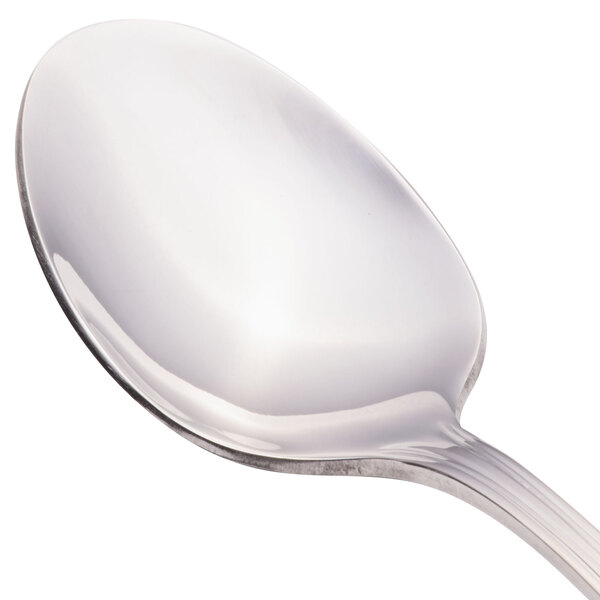 The Walco 18/10 stainless steel dessert spoon with a silver handle.