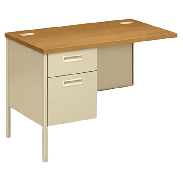 A HON Metro Classic left return desk with a white surface and brown edges and two drawers.