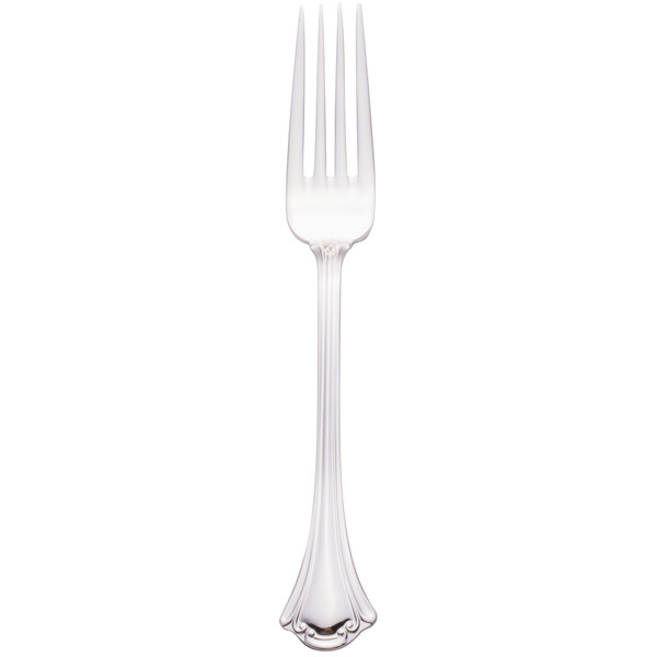 A close-up of a Walco Sentry stainless steel table fork with a silver handle.
