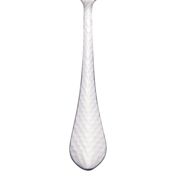 A Walco stainless steel dinner fork with a silver handle and ironstone design.