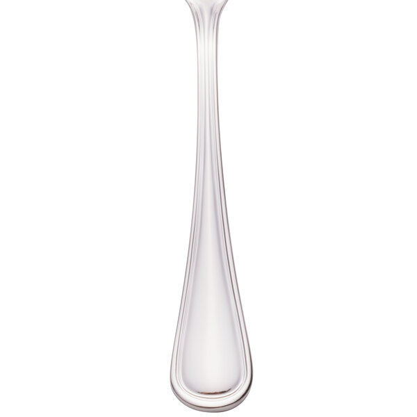 A Walco stainless steel fish fork with a flat handle.