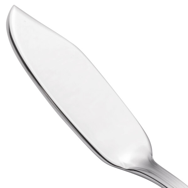 A close-up of a Walco stainless steel flat handle fish knife with a white handle.