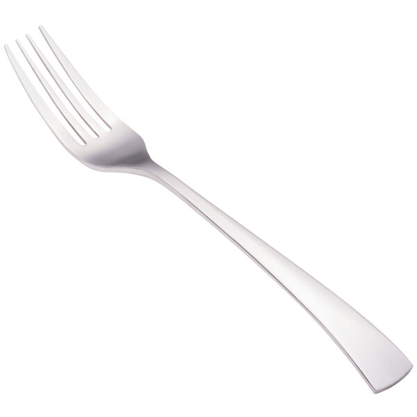 A close-up of a Walco Freya stainless steel table fork with a white handle.