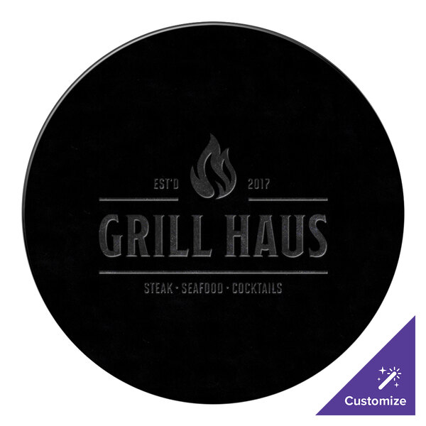 A black customizable round vinyl placemat with text on it.