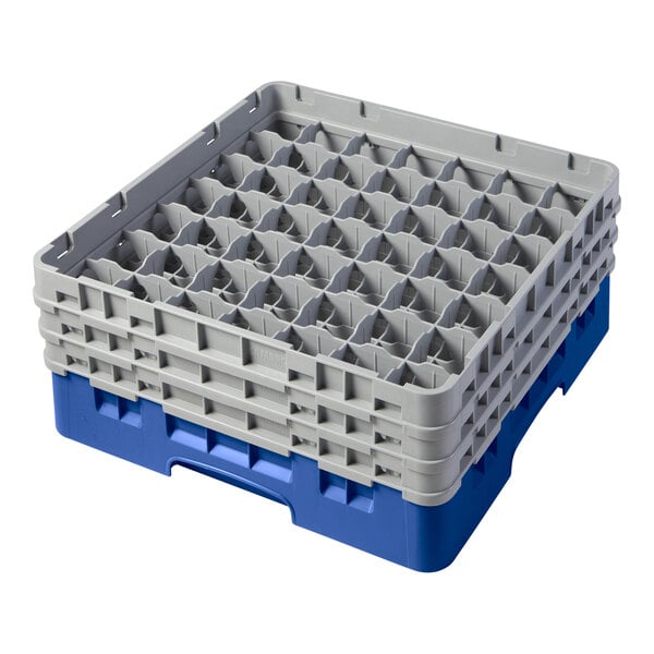 A blue and gray plastic glass rack with 49 compartments for holding and washing glasses.