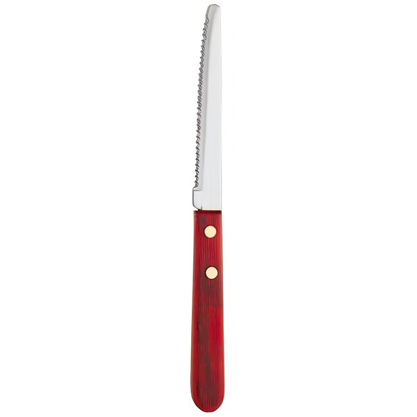 A Libbey stainless steel steak knife with a red pakkawood handle.