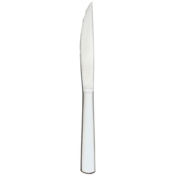 A Libbey steak knife with a white handle.