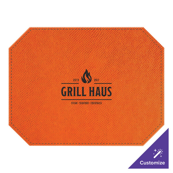 An orange octagon-shaped placemat with the words "Grill Haus" in black.