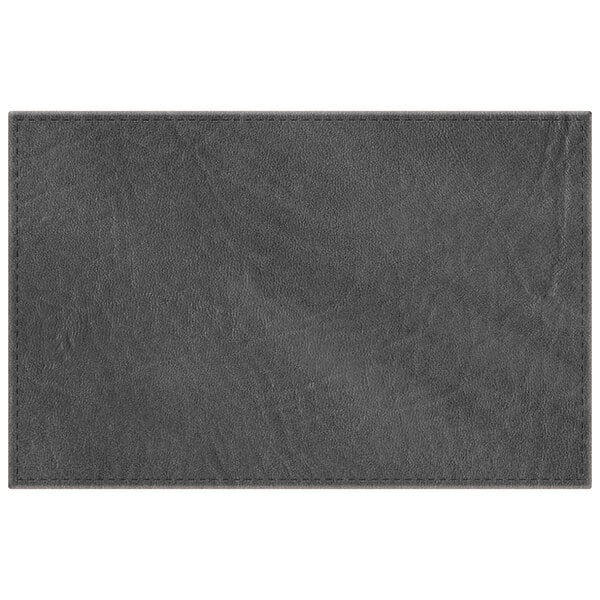 A 17" x 11" charcoal hardboard and faux leather rectangular placemat.