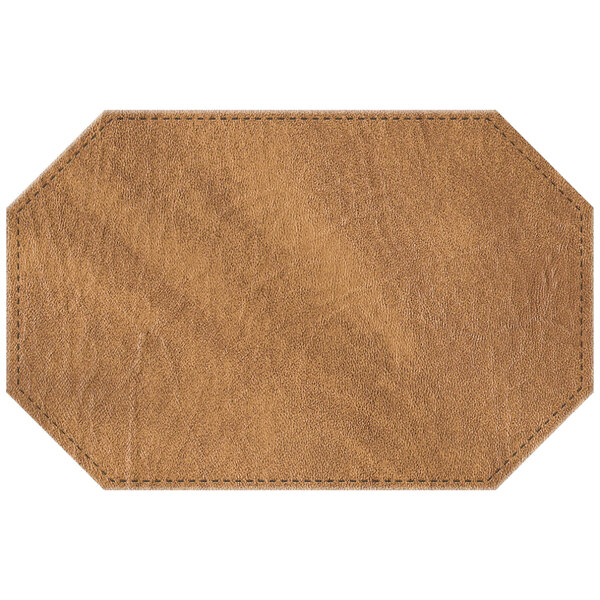 A brown faux leather octagon placemat with stitching.