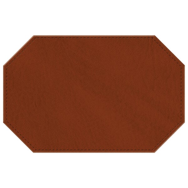 A brown faux leather octagon placemat with stitching.