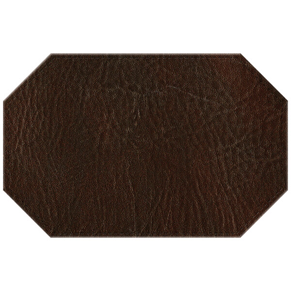 A brown hardboard and faux leather octagon placemat.