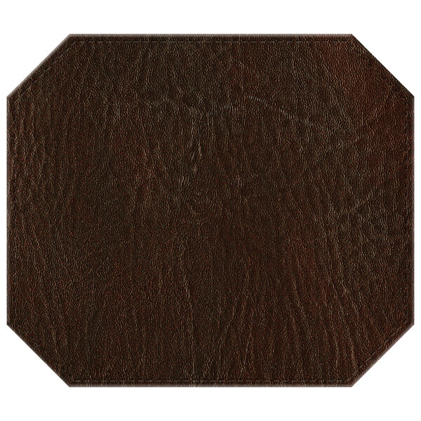 A brown hardboard and faux leather octagon placemat.