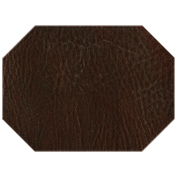 A brown hardboard and faux leather octagon placemat.