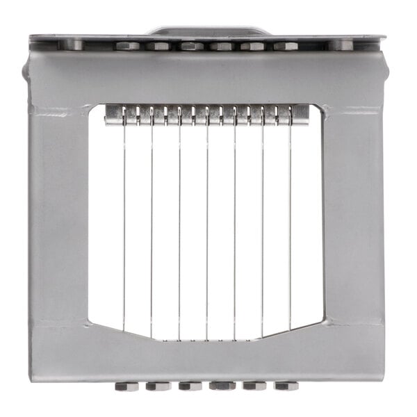 A metal Edlund slicer blade with many small metal pieces.